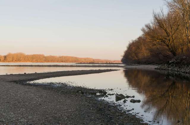 A river with low water levels.