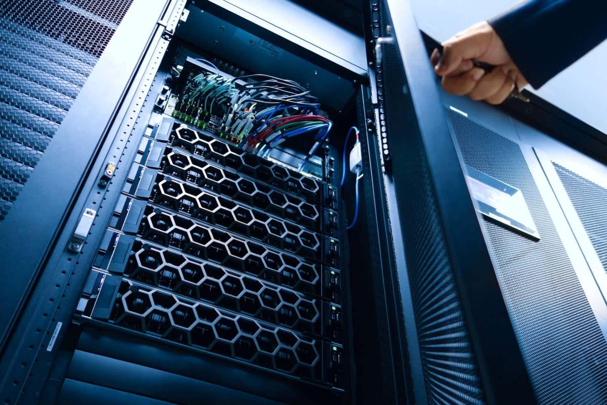 Server rack and cables inside a data center.