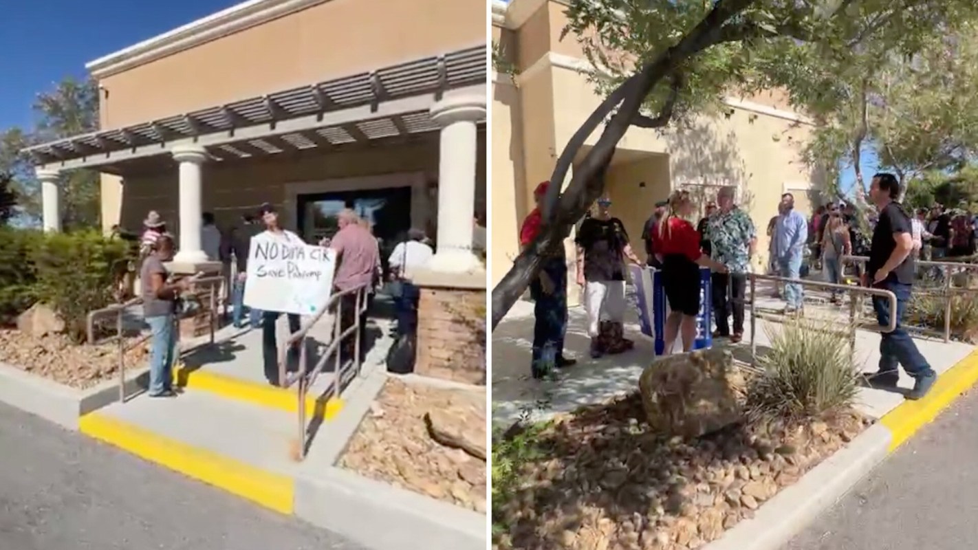 A crowd gathers outside a building with a sign reading "NO DATA CENTER Save Pahrump."