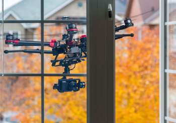 A drone outside a window.