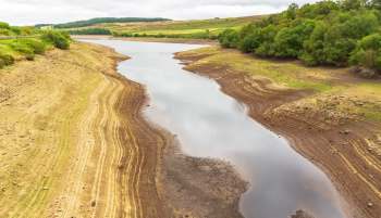 A reservoir with low water levels.