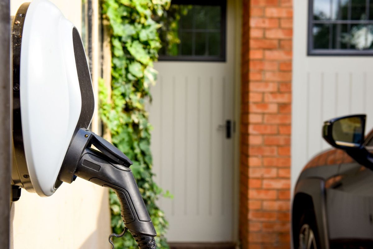 An EV charger mounted outside a home.