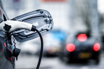 A charger plugged into a car.