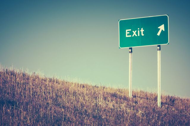 An "exit" sign on a road.