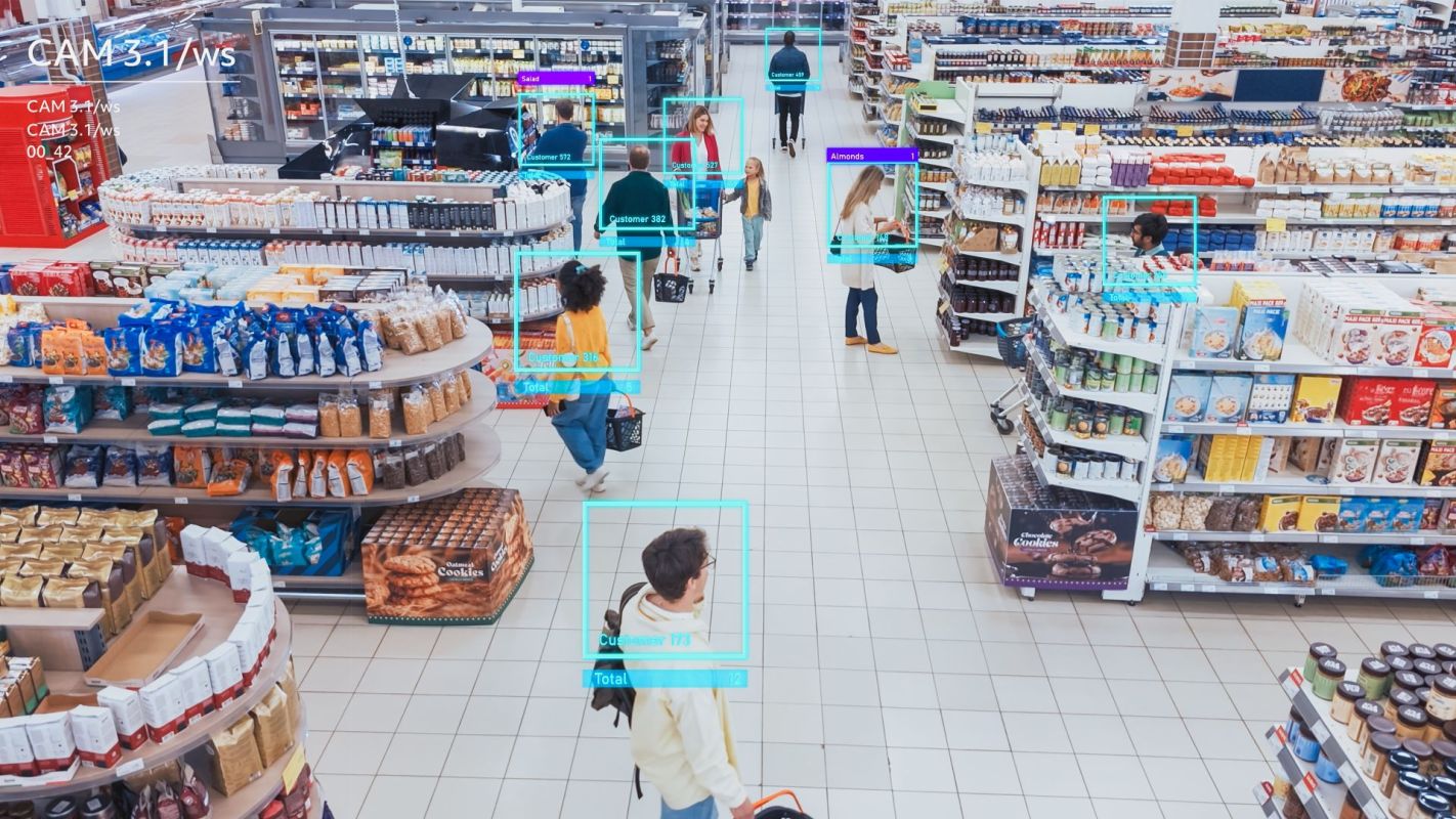 A camera in a grocery store uses facial recognition on shoppers