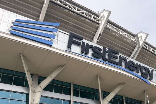The exterior of a building showing the FirstEnergy logo and blue architectural elements.