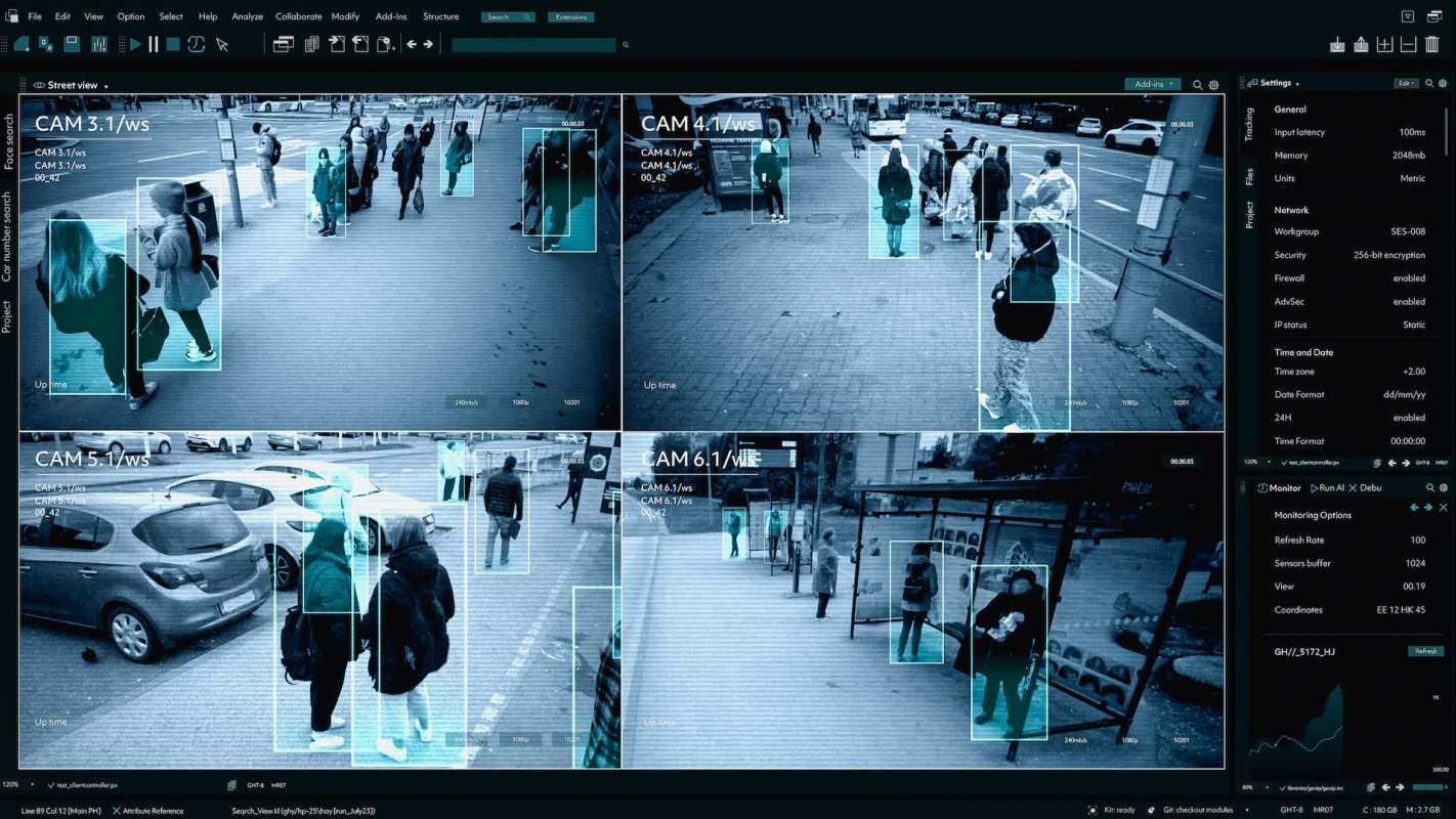 Surveillance footage of a sidewalk and street.