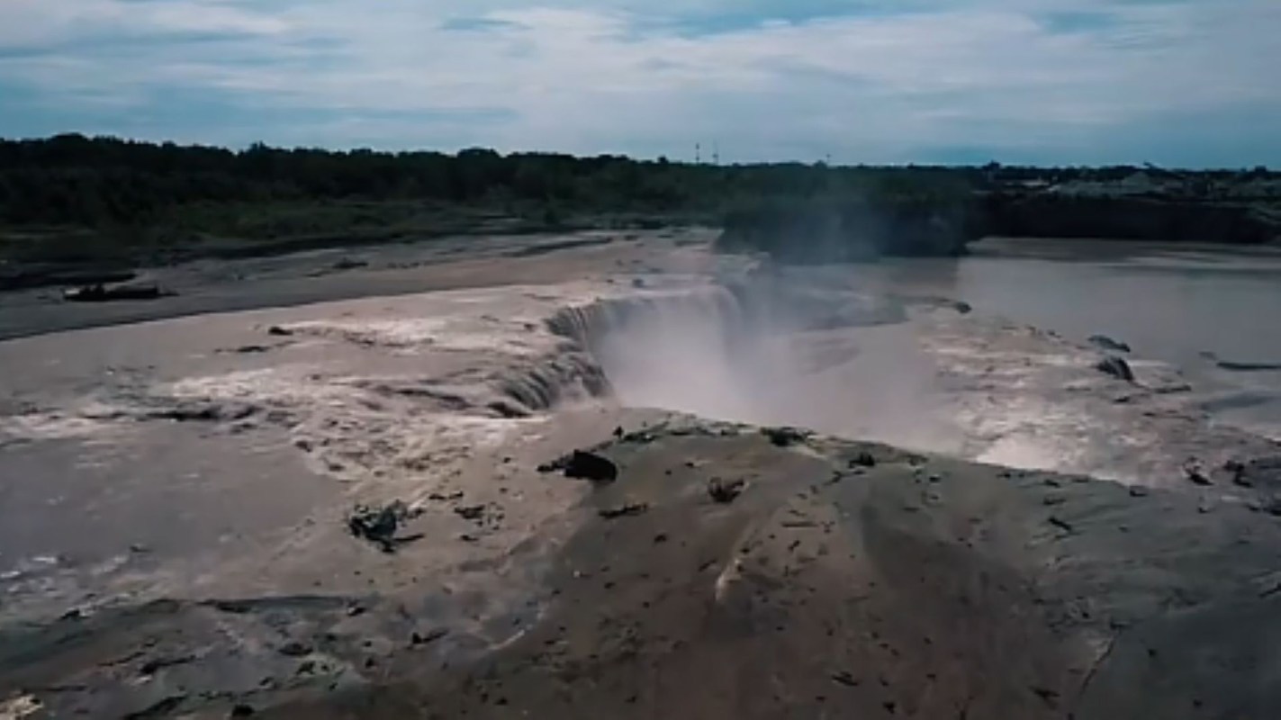Water rushing over a cliff.