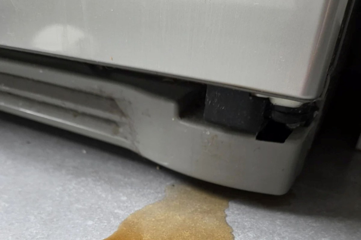 A leak coming out of a fridge.