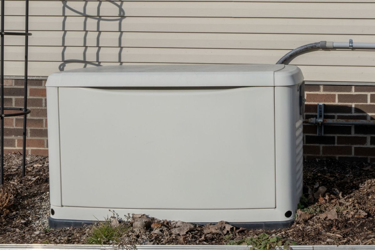 A generator outside of a home.