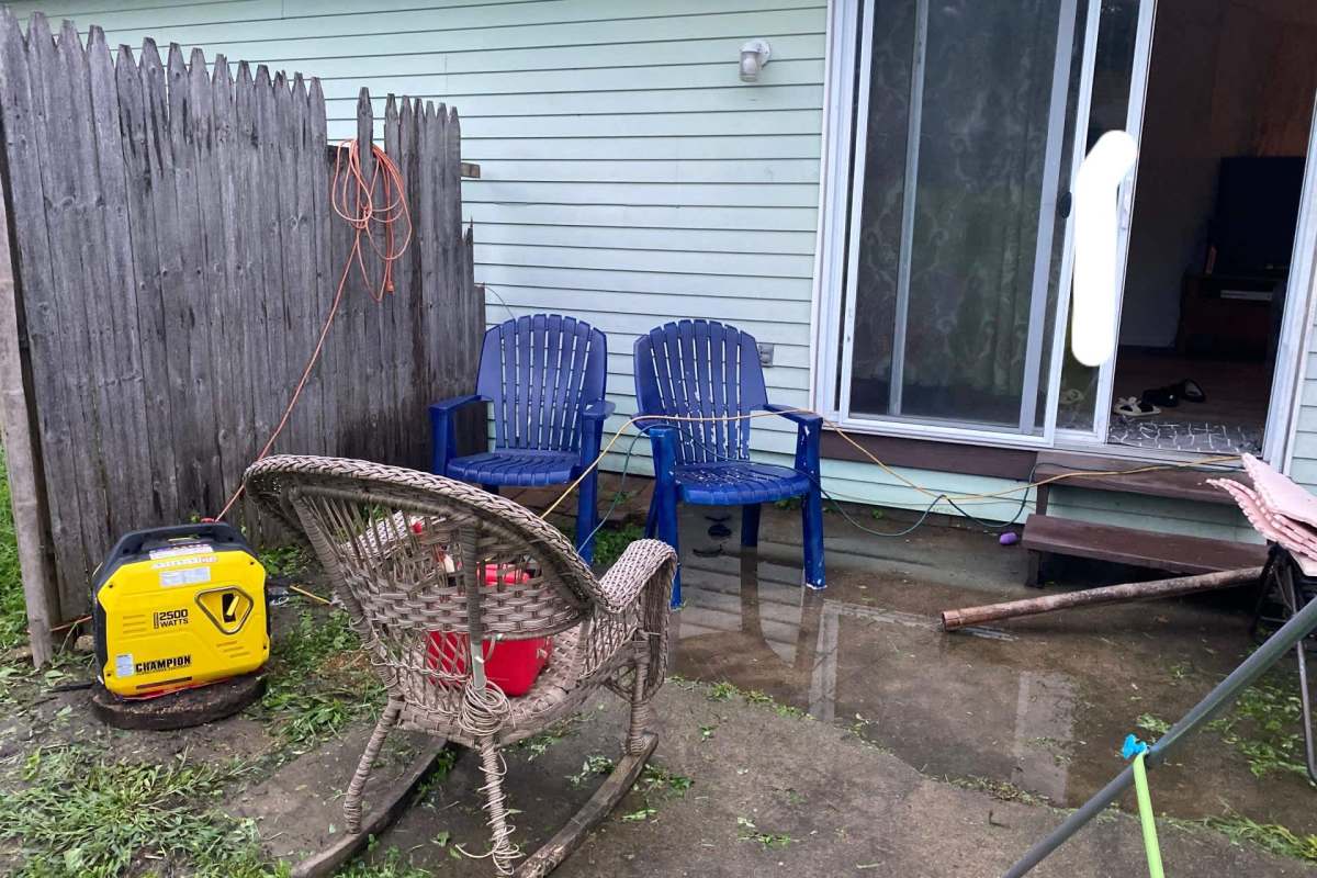 A generator outside of a home.