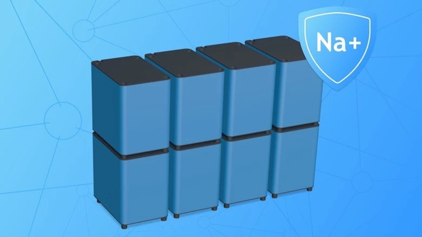 A stack of blue containers against a light blue background with a "Na+" shield emblem.