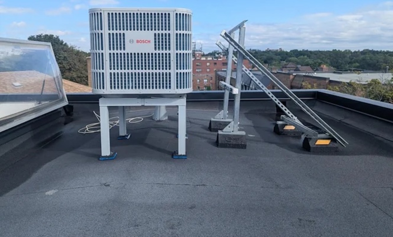 A Bosch HVAC unit on a roof.
