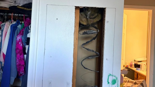 Ductwork inside a wall.