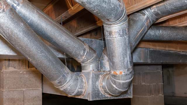 Metal ductwork in a basement.