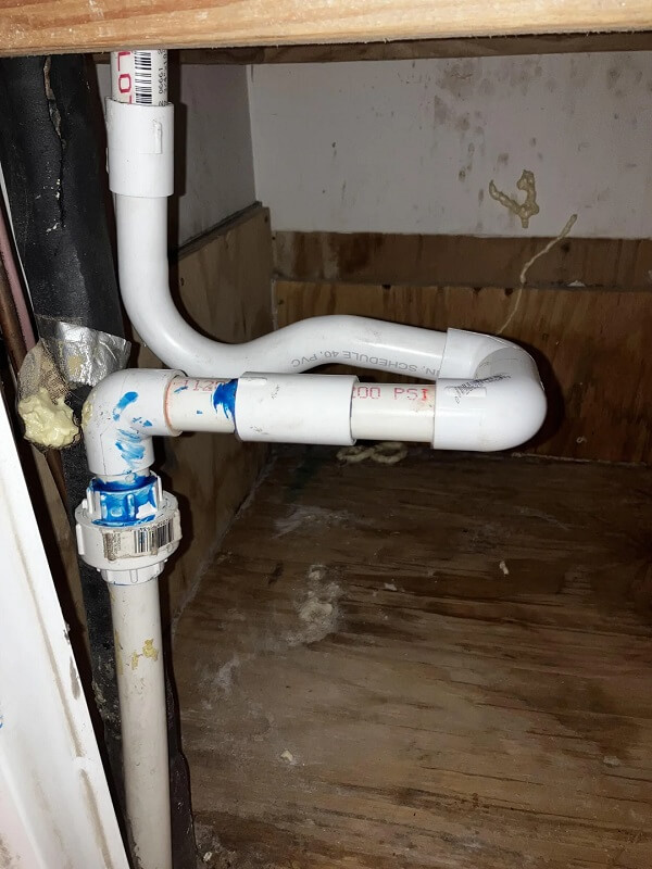 The piping for an HVAC unit.
