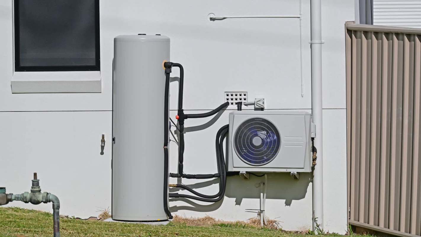 A heat pump water tank and evaporator.