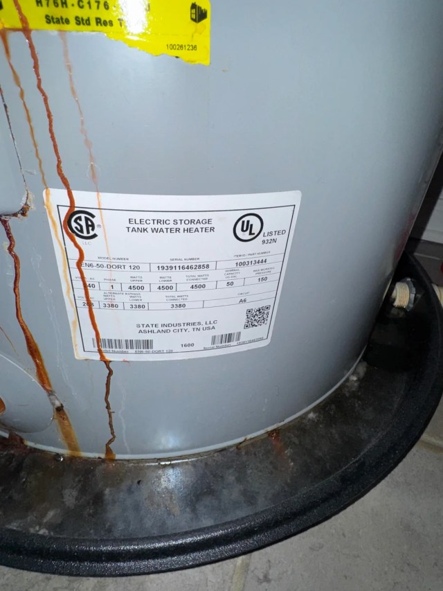 Rust-colored streaks on a water heater.