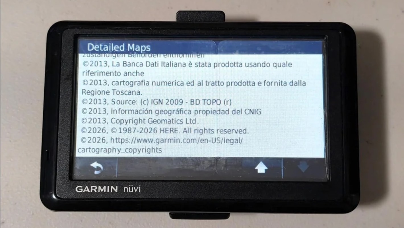 A Garmin GPS device displaying detailed maps and copyright information.