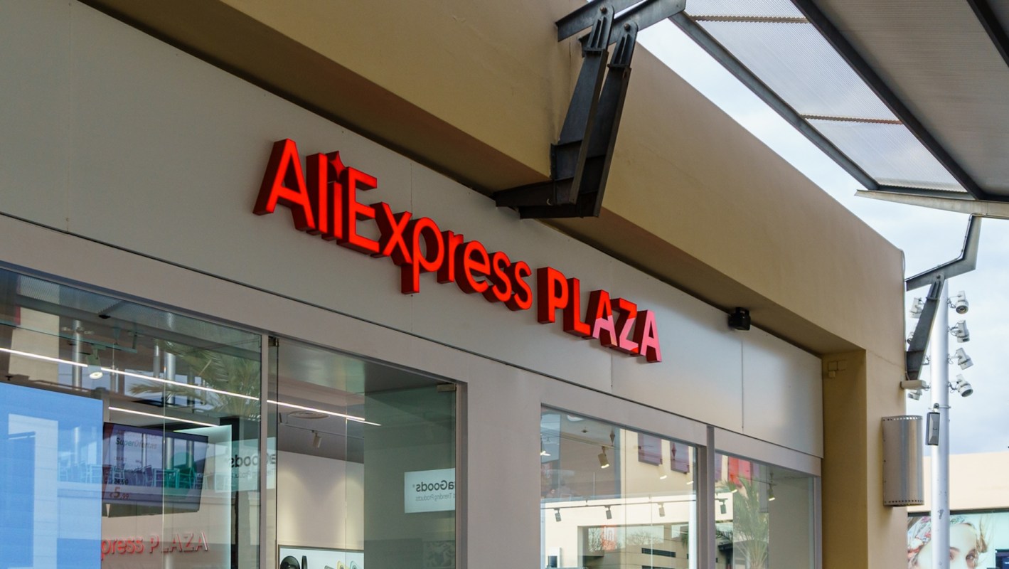 The exterior of a store displaying the sign "AliExpress PLAZA."