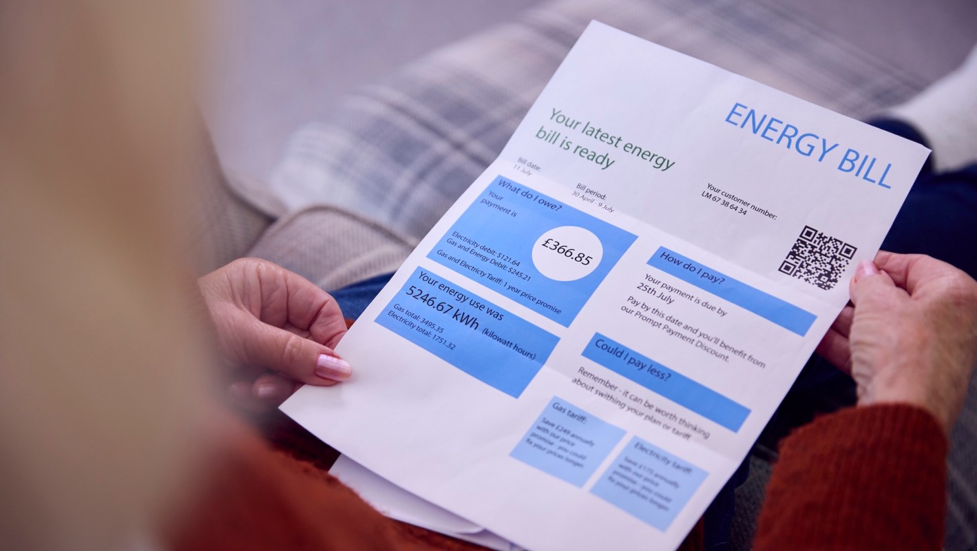 A person reviewing an energy bill.