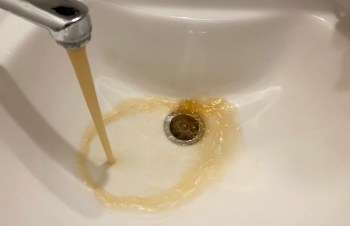Brown water from a tap.
