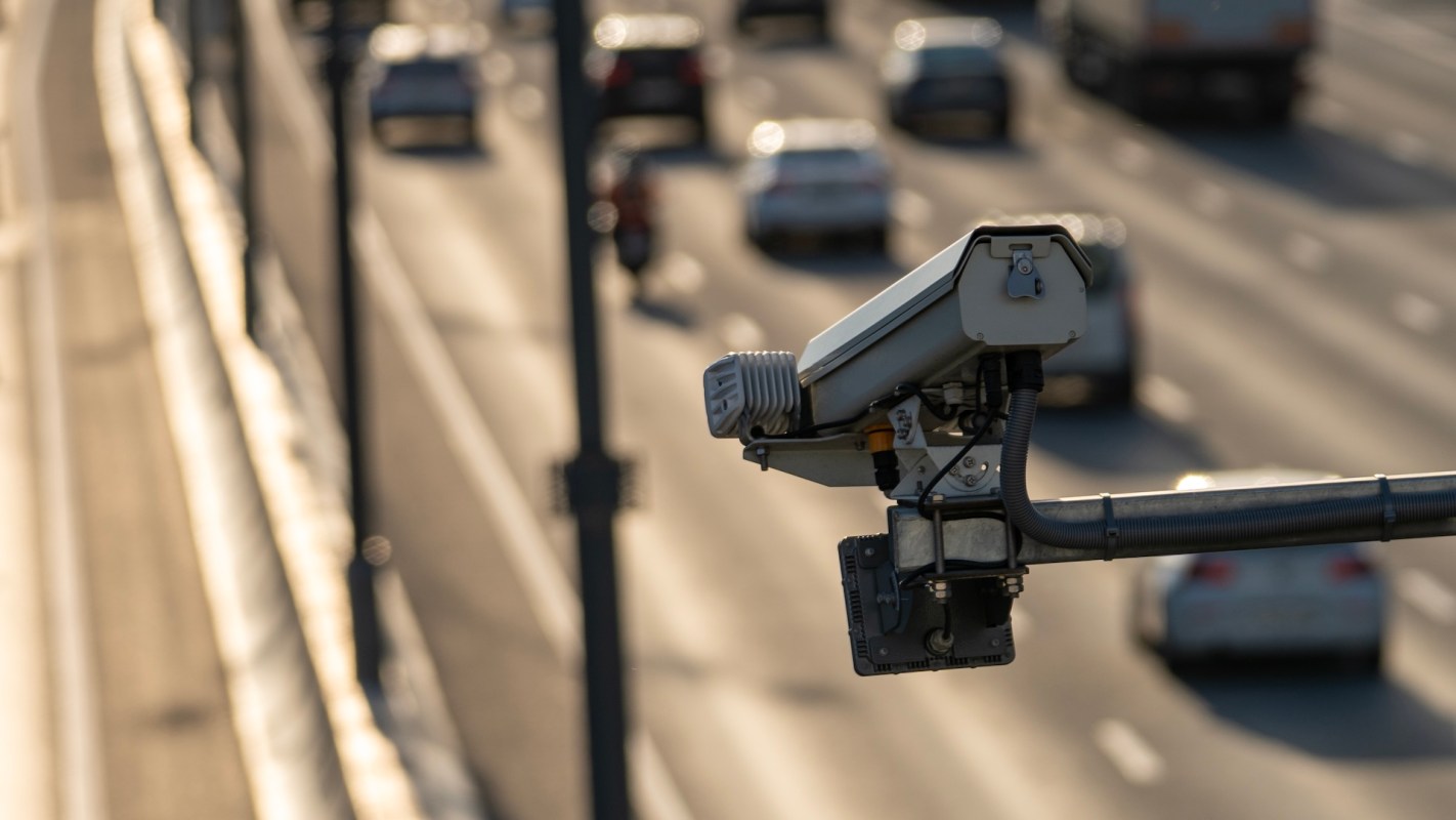A traffic camera monitoring a highway.