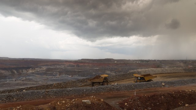 Dump trucks at a copper mine.