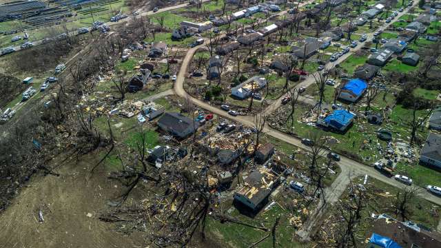 A neighborhood with heavy storm damage.