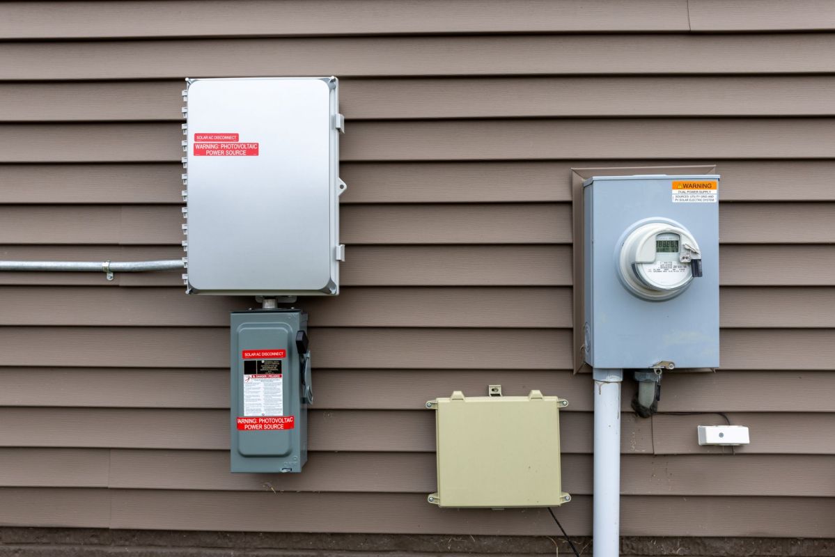 A solar power inverter and a power meter.