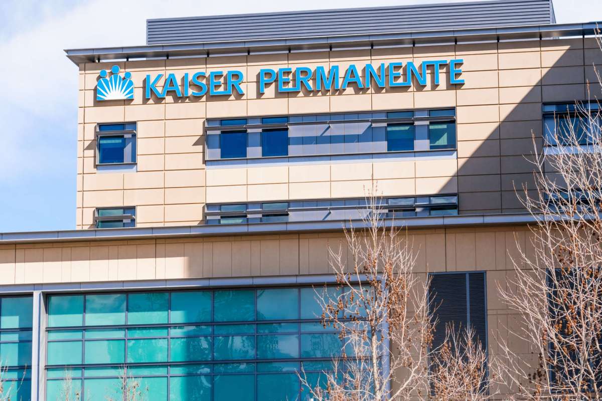 A building exterior with the sign "Kaiser Permanente" displayed prominently.