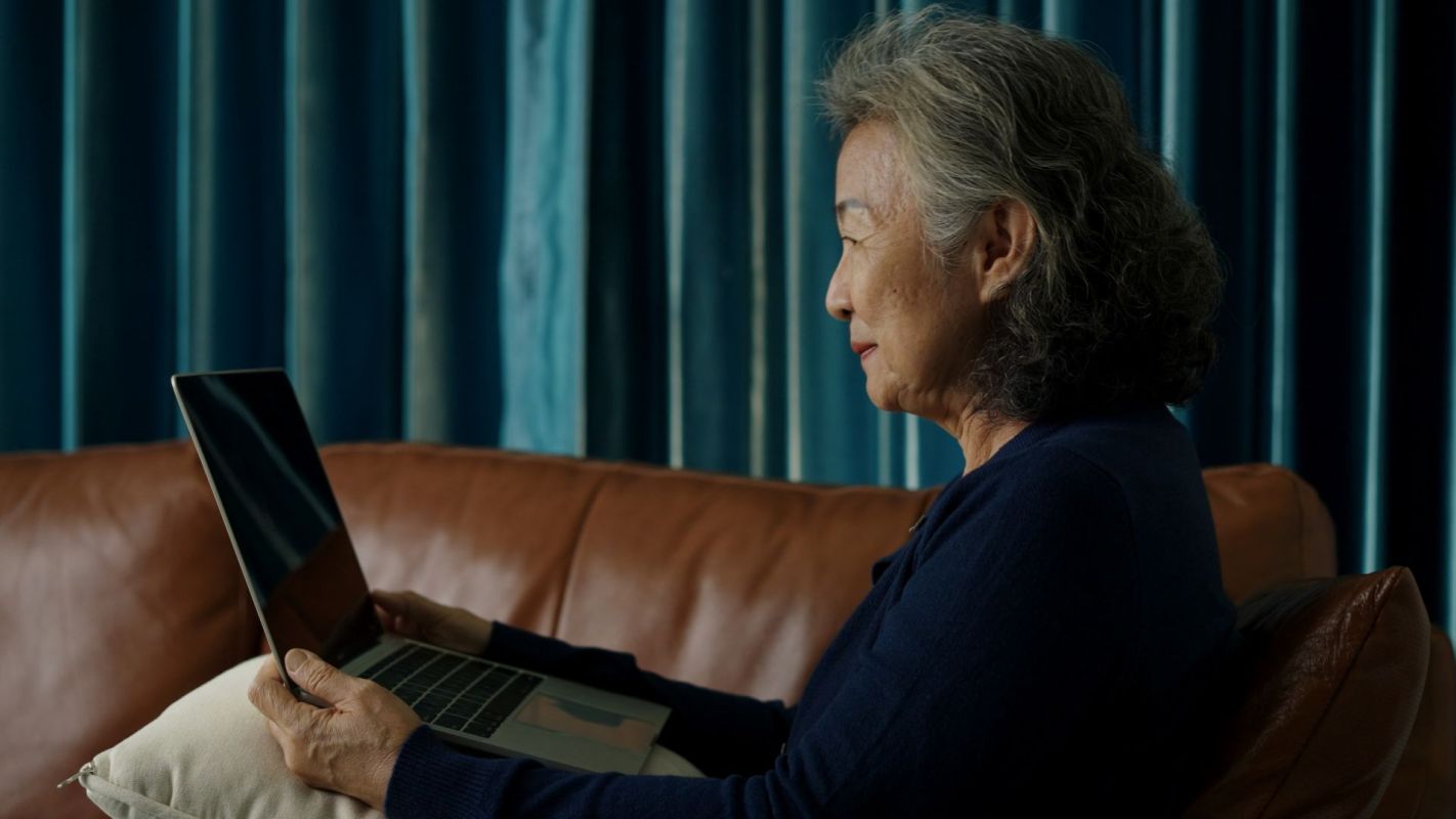 A woman on a laptop.