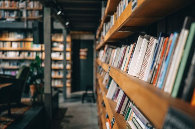 Stacks of books in a library.