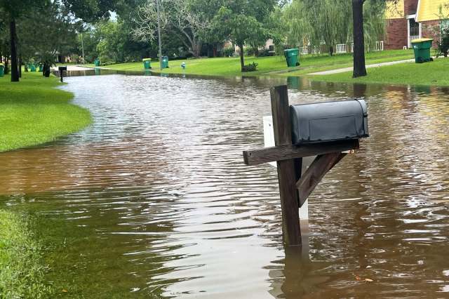 A flooded residential street.