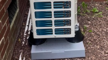 An HVAC on plastic cones.