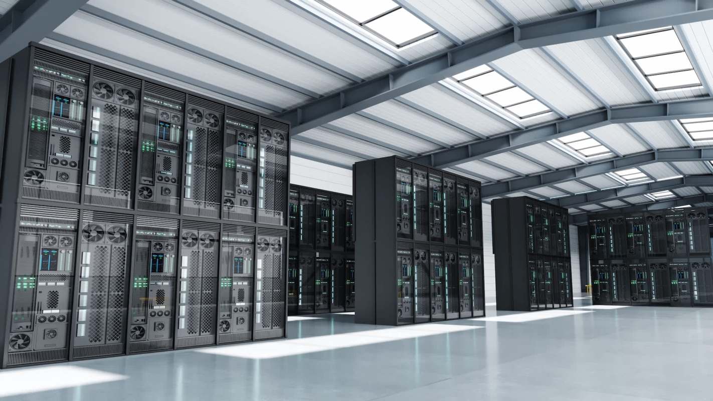 A data center featuring rows of server racks in a spacious, modern facility.