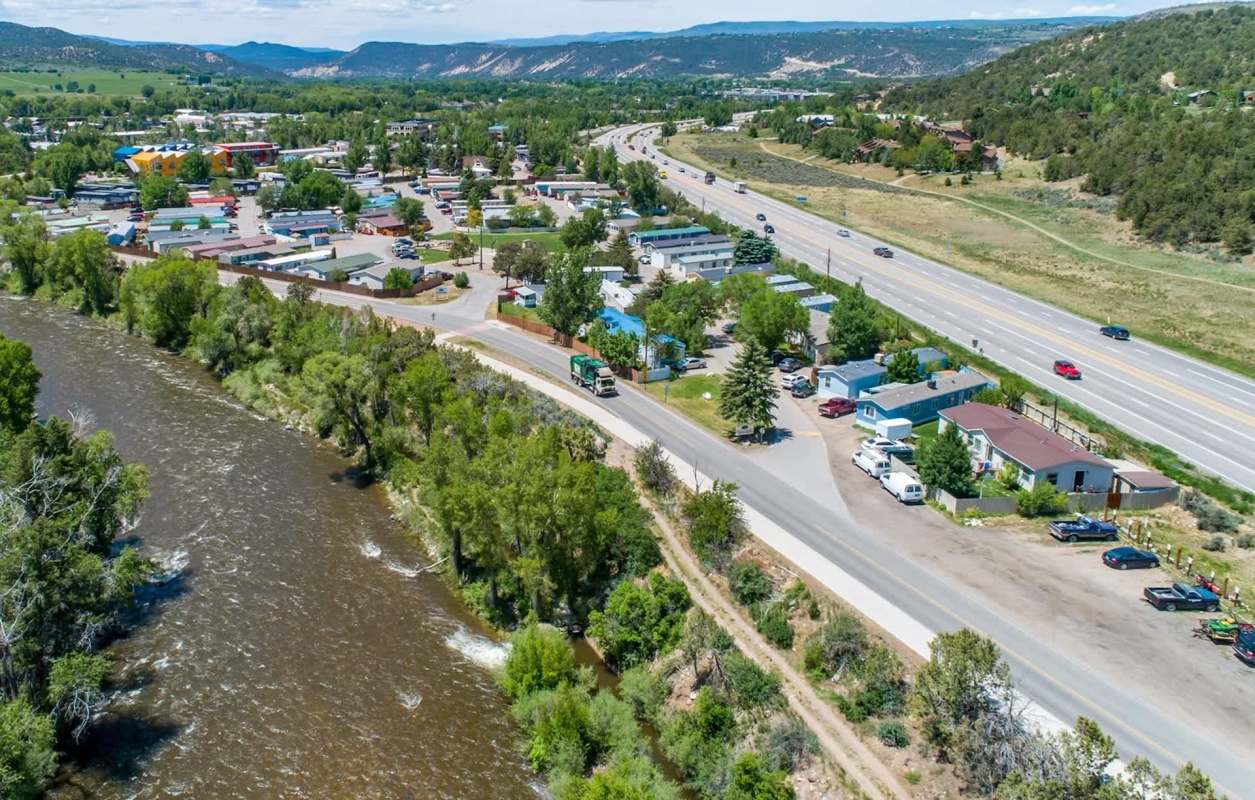 A riverside mobile home community.