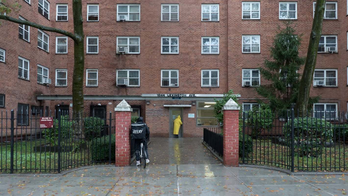 A brick apartment building.