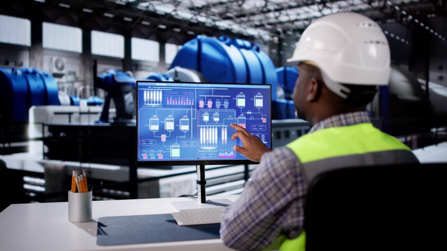 Oil worker using computer