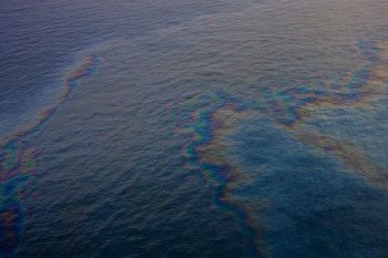 An oil spill in the ocean.