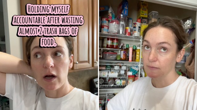 A woman stands in a kitchen, looking at an organized pantry filled with food items.