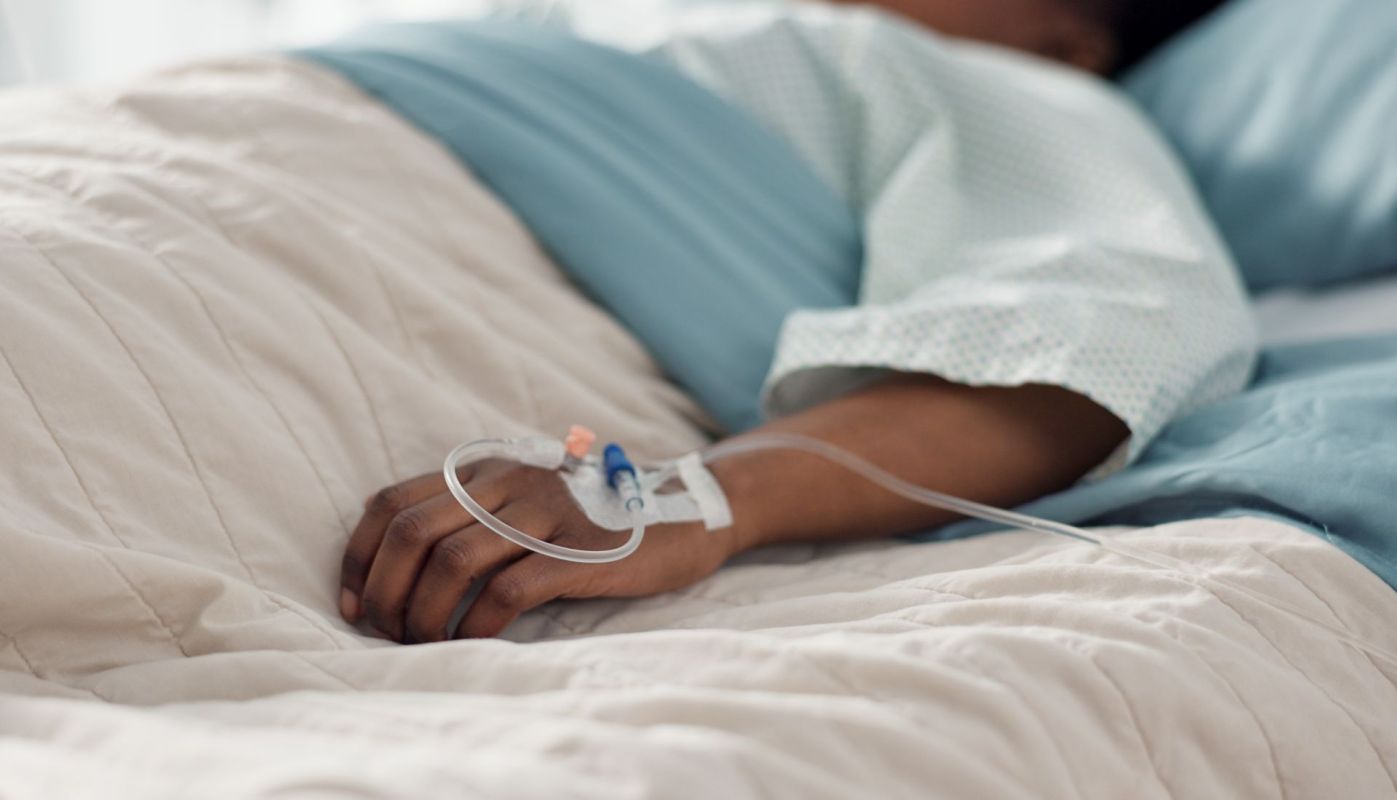 A person in a hospital bed.