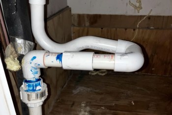 The piping for an HVAC unit.
