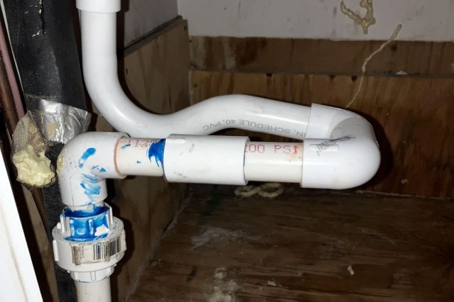 The piping for an HVAC unit.