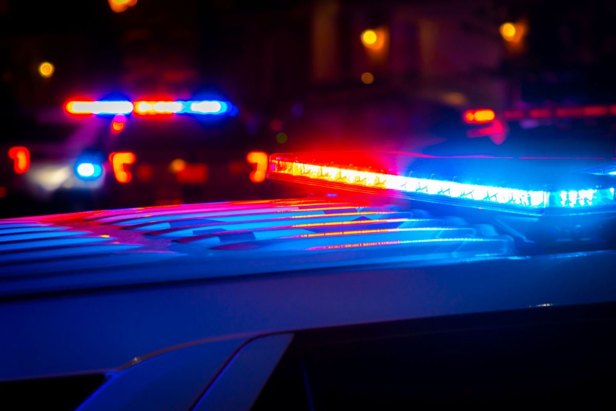 Red and blue lights atop a police car.