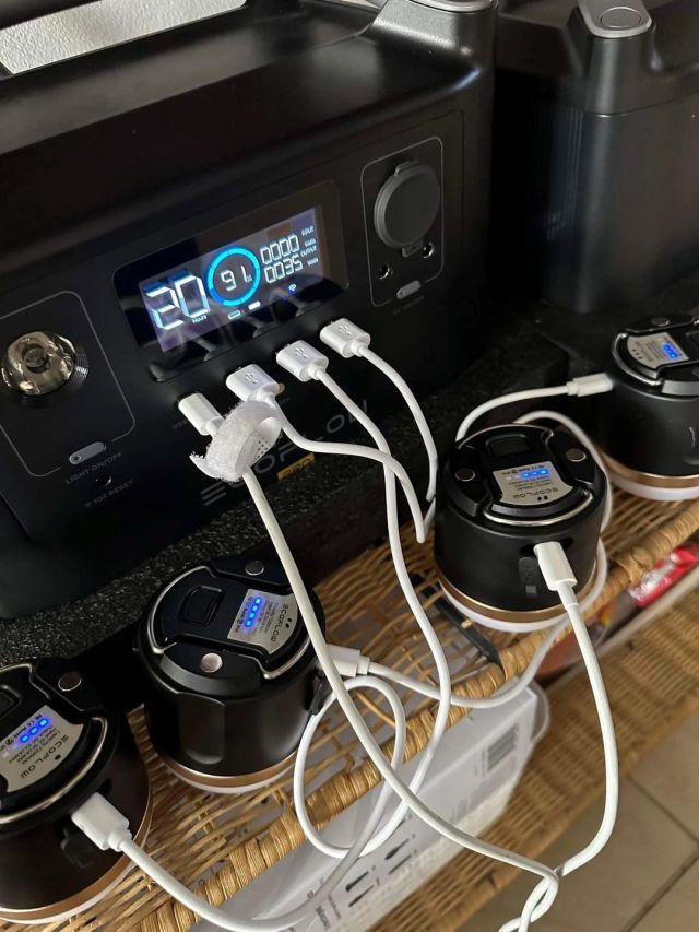 Camping lights plugged into EcoFlow's River Pro battery system.