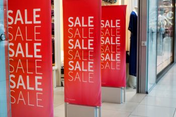 Sale signs outside of a store.