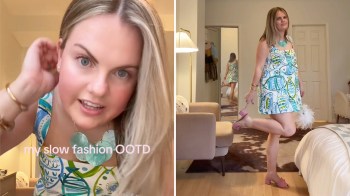 A woman models a colorful dress with fish patterns in a stylish room with a mirror and a bed.