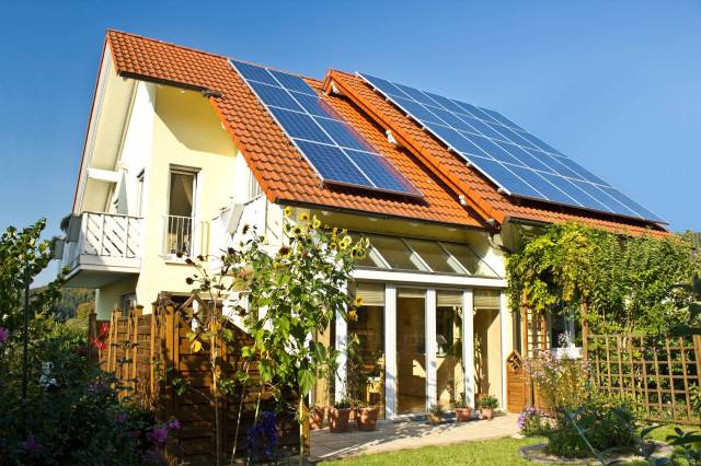 A house with solar panels.