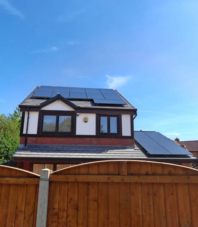 A house with rooftop solar panels.
